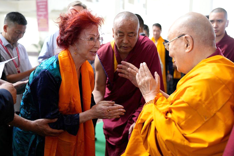 Mynavati receiving blessings from His Holiness the Dalai Lama